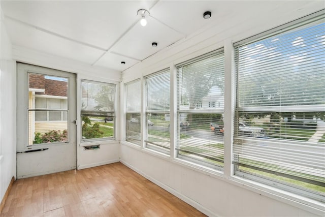 1612 Greene Ave NE, Cedar Rapids, IA 52402 - unfurnished sunroom featuring healthy amount of natural light and wood finished floors