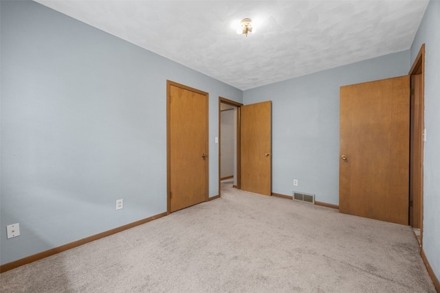 203 B Ave, Newhall, IA 52315 - unfurnished bedroom with carpet and baseboards