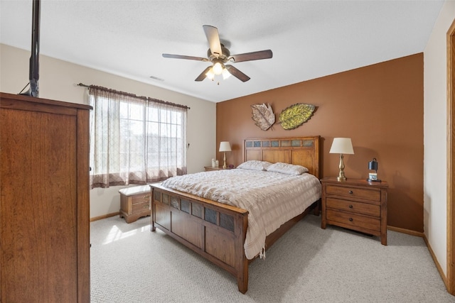 3810 Waterview Ct SW, Cedar Rapids, IA 52404 - bedroom featuring light carpet and a ceiling fan