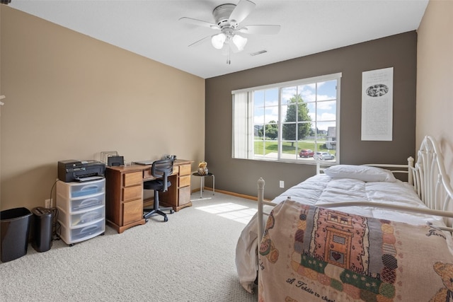 3810 Waterview Ct SW, Cedar Rapids, IA 52404 - carpeted bedroom featuring a desk and ceiling fan
