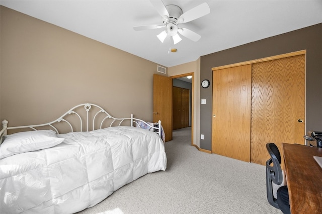 3810 Waterview Ct SW, Cedar Rapids, IA 52404 - bedroom with carpet floors, a closet, ceiling fan, and an office area