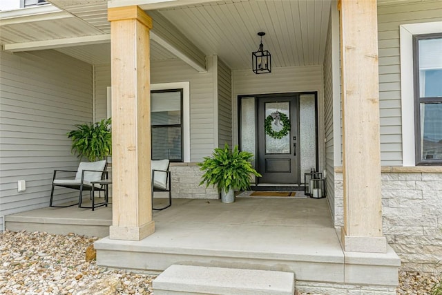 608 Pointer Cir, Center Point, IA 52213 - view of exterior entry with covered porch