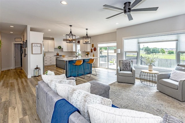608 Pointer Cir, Center Point, IA 52213 - living area with recessed lighting, a ceiling fan, and light wood-style flooring