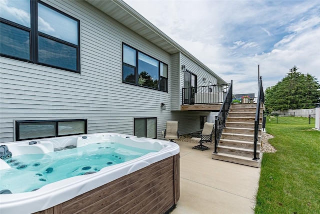 608 Pointer Cir, Center Point, IA 52213 - view of patio featuring stairs, a hot tub, and a deck