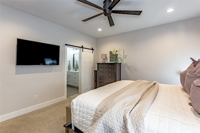 608 Pointer Cir, Center Point, IA 52213 - carpeted bedroom with a barn door, recessed lighting, ensuite bathroom, and ceiling fan