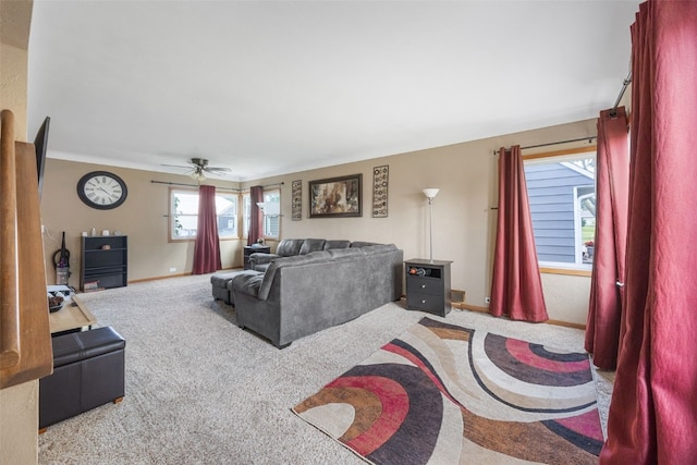 908 18th St SW, Cedar Rapids, IA 52404 - living area featuring carpet flooring and ceiling fan