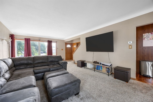 908 18th St SW, Cedar Rapids, IA 52404 - living room with carpet flooring and baseboards