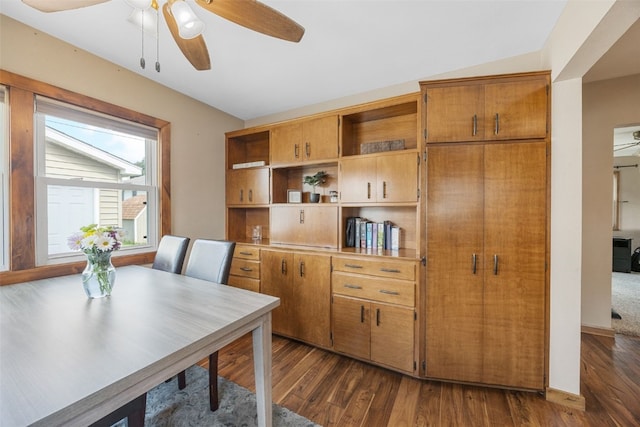 908 18th St SW, Cedar Rapids, IA 52404 - office area featuring a ceiling fan and dark wood-style flooring