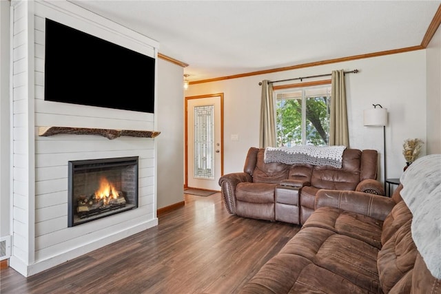 3210 5th St, Marion, IA 52302 - living room with dark wood-type flooring, crown molding, and a glass covered fireplace