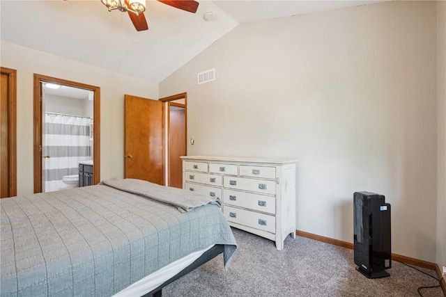 3210 5th St, Marion, IA 52302 - carpeted bedroom with lofted ceiling, ensuite bath, and ceiling fan