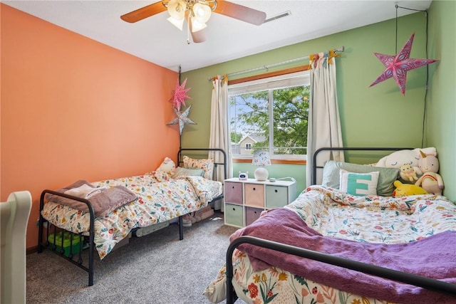 3210 5th St, Marion, IA 52302 - bedroom featuring carpet and a ceiling fan