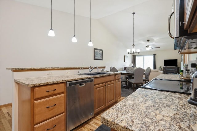 5752 Oakwood Ave NE Unit 3, Cedar Rapids, IA 52402 - kitchen featuring appliances with stainless steel finishes, a ceiling fan, light wood finished floors, light stone countertops, and pendant lighting