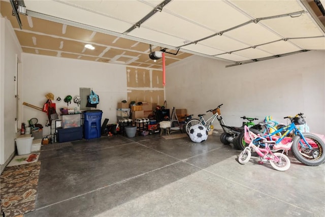 5752 Oakwood Ave NE Unit 3, Cedar Rapids, IA 52402 - garage featuring a garage door opener