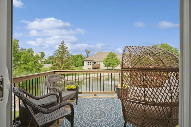5752 Oakwood Ave NE Unit 3, Cedar Rapids, IA 52402 - wooden terrace featuring a water view