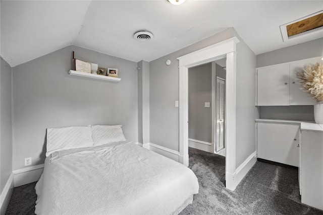 1307 8th St NW, Cedar Rapids, IA 52405 - bedroom with carpet and vaulted ceiling