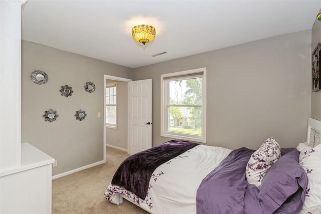 1916 Oak Knoll Ct SE, Cedar Rapids, IA 52403 - bedroom featuring light colored carpet and baseboards