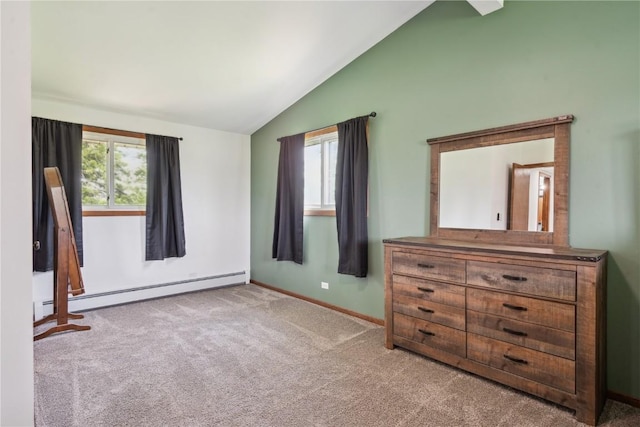 5995 32nd Ave, Shellsburg, IA 52332 - unfurnished bedroom with a baseboard heating unit, lofted ceiling, and carpet flooring