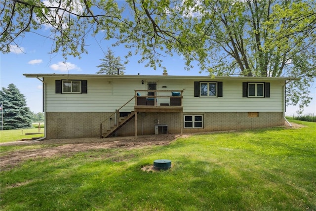 5995 32nd Ave, Shellsburg, IA 52332 - back of house featuring stairs, a yard, brick siding, and a deck