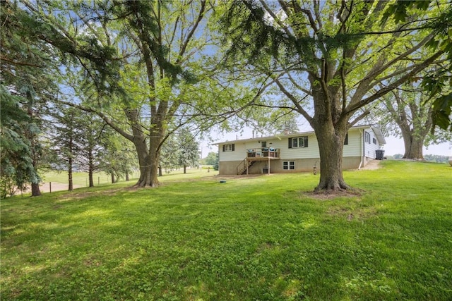 5995 32nd Ave, Shellsburg, IA 52332 - view of green lawn featuring stairway and a wooden deck