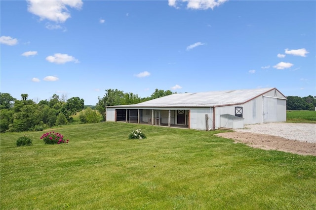 5995 32nd Ave, Shellsburg, IA 52332 - view of grassy yard featuring a pole building and an outbuilding