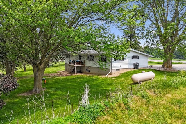 5995 32nd Ave, Shellsburg, IA 52332 - view of grassy yard featuring stairway and a deck