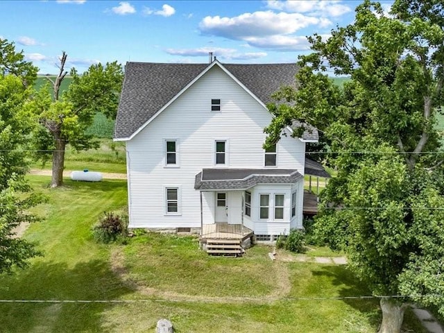 1931 140th St, Lowden, IA 52255 - back of house with roof with shingles and a yard