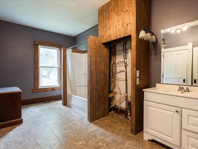 1931 140th St, Lowden, IA 52255 - bathroom featuring vanity and shower / bath combo with shower curtain