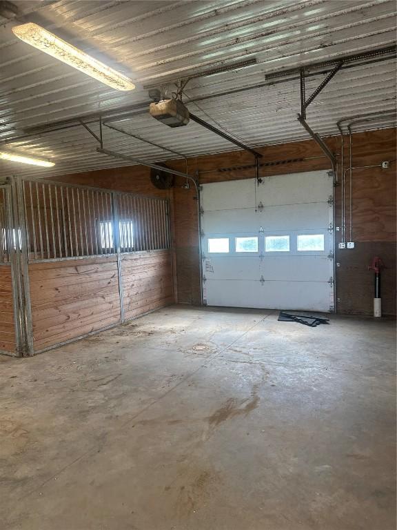 1931 140th St, Lowden, IA 52255 - garage with a garage door opener