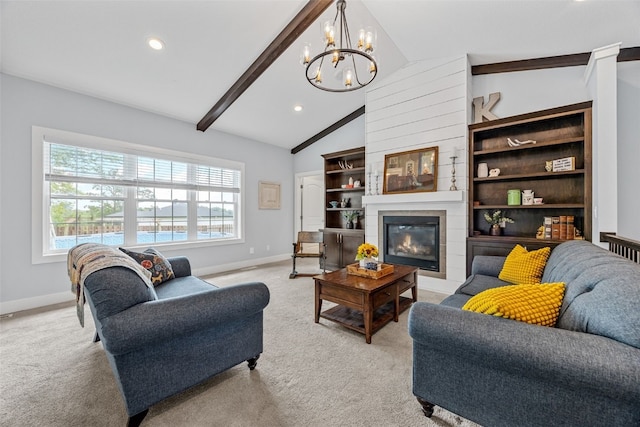 1062 Oak View Ct, Tipton, IA 52772 - living room featuring a chandelier, light colored carpet, a tiled fireplace, and recessed lighting