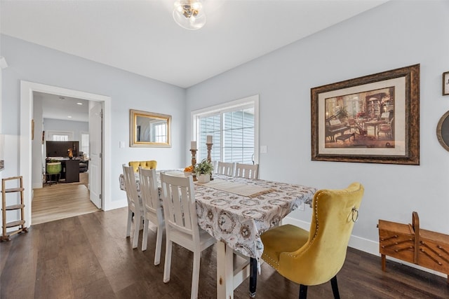 1062 Oak View Ct, Tipton, IA 52772 - dining room with dark wood-style flooring and plenty of natural light