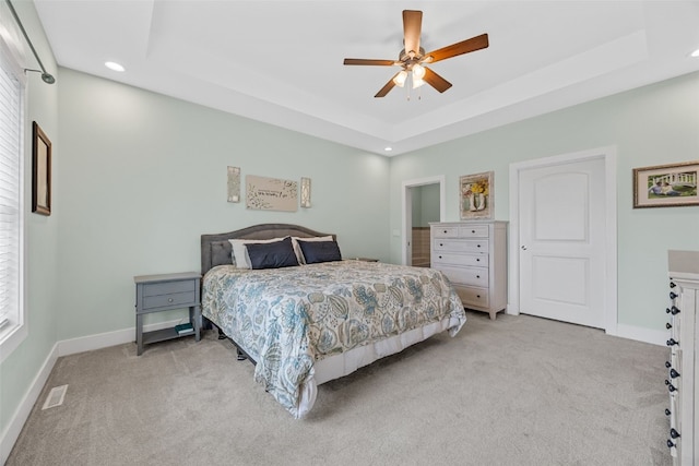 1062 Oak View Ct, Tipton, IA 52772 - bedroom with light carpet, recessed lighting, a raised ceiling, and a ceiling fan