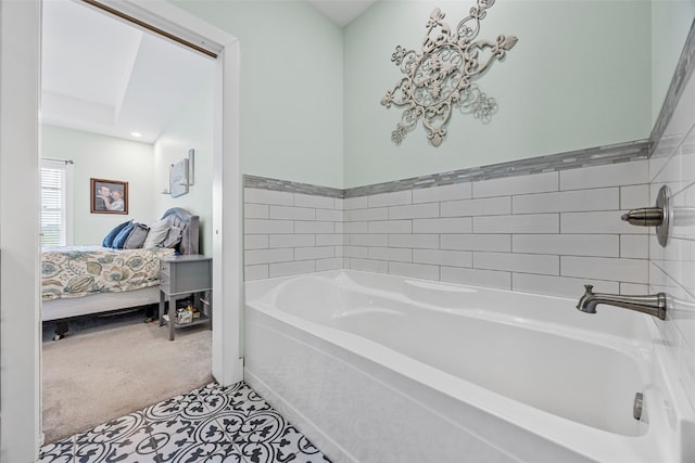 1062 Oak View Ct, Tipton, IA 52772 - ensuite bathroom with a garden tub and tile patterned flooring