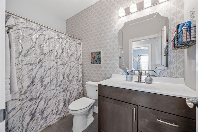 1062 Oak View Ct, Tipton, IA 52772 - full bathroom with wallpapered walls, vanity, and a shower with curtain