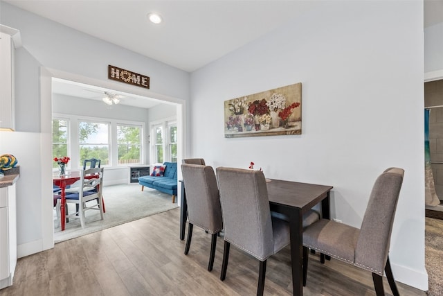 1062 Oak View Ct, Tipton, IA 52772 - dining room featuring wood finished floors and recessed lighting