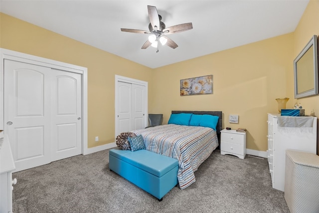 1062 Oak View Ct, Tipton, IA 52772 - carpeted bedroom with two closets and ceiling fan