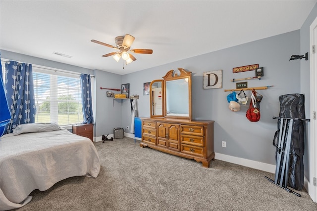 1062 Oak View Ct, Tipton, IA 52772 - bedroom with carpet floors and ceiling fan
