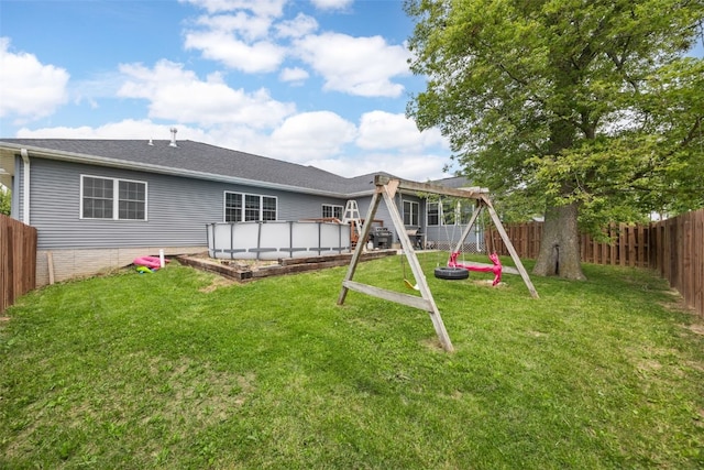 1062 Oak View Ct, Tipton, IA 52772 - rear view of property with a fenced backyard