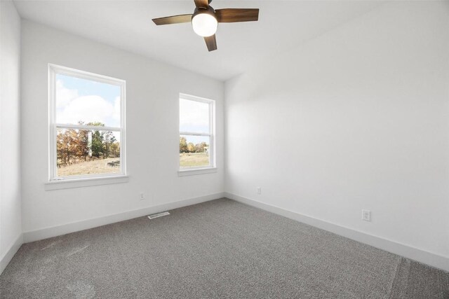 2682 Burr Oak Ct, Marion, IA 52302 - carpeted spare room with a ceiling fan and baseboards
