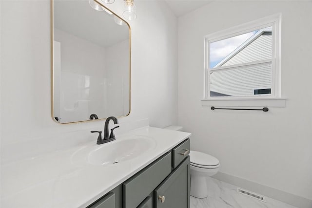 2682 Burr Oak Ct, Marion, IA 52302 - bathroom with vanity and marble look tiles