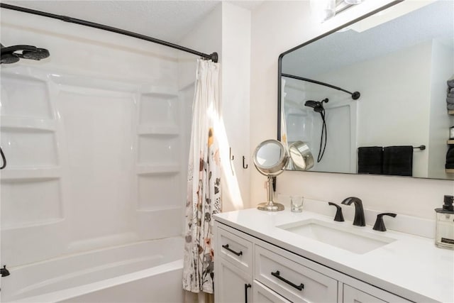 1932 N Ridge Dr, Coralville, IA 52241 - bathroom featuring vanity and shower / bath combo with shower curtain