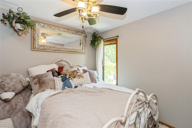 1932 N Ridge Dr, Coralville, IA 52241 - bedroom featuring ceiling fan