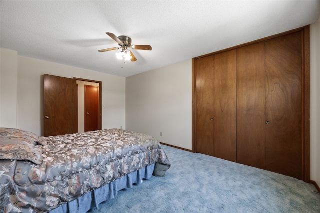 105 Parkview Dr, Tipton, IA 52772 - carpeted bedroom featuring a closet and a ceiling fan