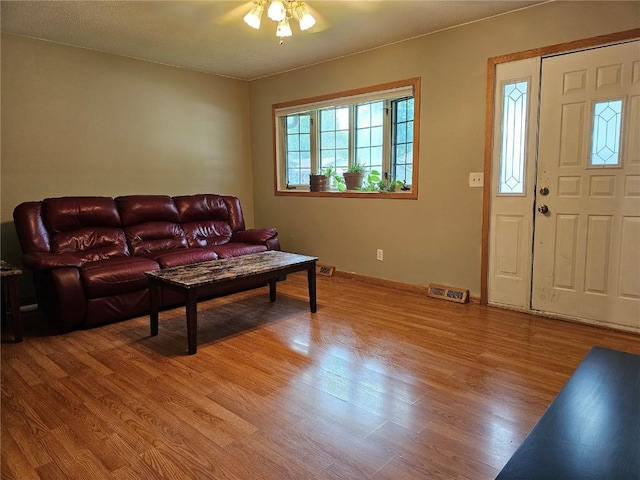 1523 Golden Valley Dr, Bettendorf, IA 52722 - living area featuring wood finished floors and a ceiling fan