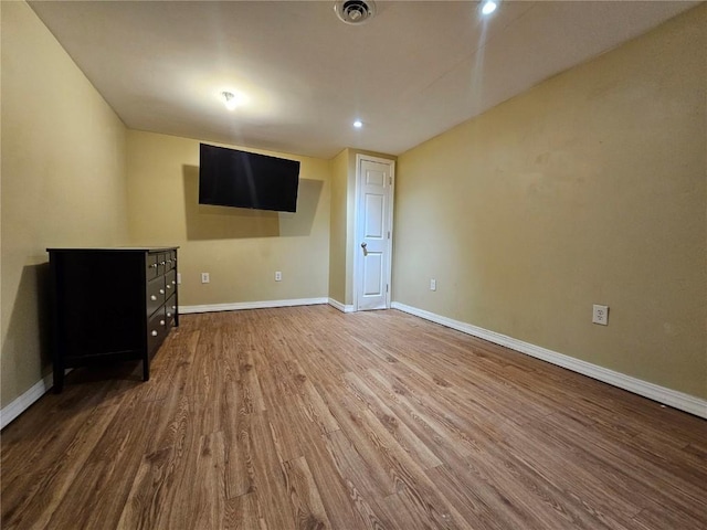 1523 Golden Valley Dr, Bettendorf, IA 52722 - unfurnished living room with wood finished floors and recessed lighting