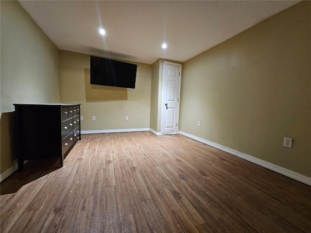 1523 Golden Valley Dr, Bettendorf, IA 52722 - empty room with wood finished floors and recessed lighting