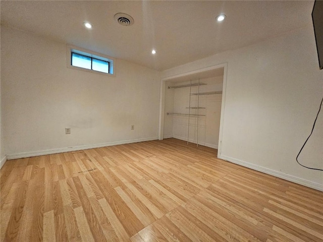 1523 Golden Valley Dr, Bettendorf, IA 52722 - unfurnished bedroom featuring light wood finished floors, recessed lighting, and a closet