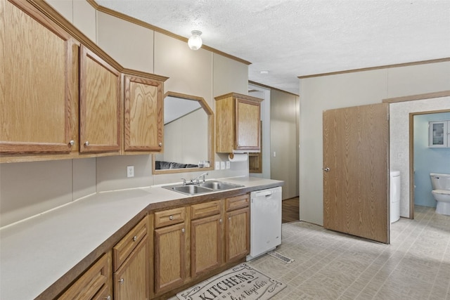 3017 118th St, Amana, IA 52203 - kitchen featuring white dishwasher, a textured ceiling, crown molding, washer / clothes dryer, and brown cabinetry