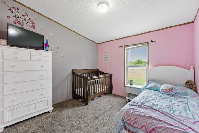 3017 118th St, Amana, IA 52203 - bedroom with a textured ceiling, carpet flooring, lofted ceiling, and ornamental molding