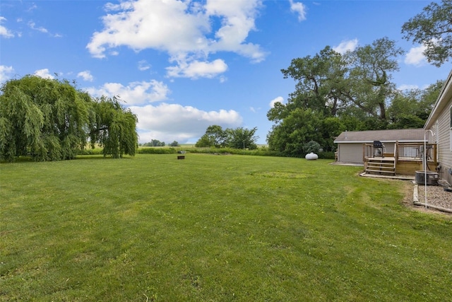 3017 118th St, Amana, IA 52203 - view of grassy yard with a wooden deck