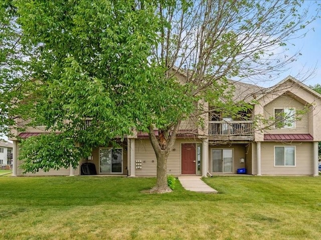 1020 240th St NE Unit 8, North Liberty, IA 52317 - obstructed view of property featuring a front lawn